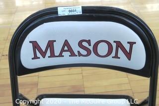 Padded Metal Folding Chair with George Mason Logo.  Used as Home Basketball Team Seating in the Pit