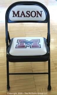 Padded Metal Folding Chair with George Mason Logo.  Used as Home Basketball Team Seating in the Pit