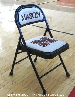 Padded Metal Folding Chair with George Mason Logo.  Used as Home Basketball Team Seating in the Pit