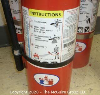 (4) Fire Extinguishers and Hangers; 3 Badger & 1 brand unknown