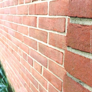 (1) Red Clay Brick from the Exterior Wall Near "The Pathway". Own Your Own Piece of George Mason High School.