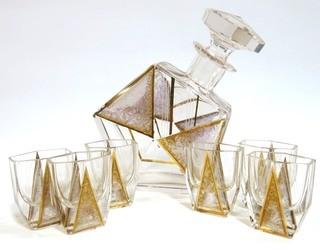 1930's Karl Palda Bohemian Czech Art Deco Cut Glass Liquor Decanter with Gold Decoration and 6 Glasses. <br> <br> Many of the Karl Palda Bohemian Art Deco cut glass pieces in this auction were featured in the book “Collectible Bohemian Glass (1915 – 1945) Volume II” by Robert & Deborah Truitt.