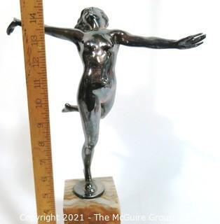 Vintage Art Deco Nude Dancer on Marble Base Signed by Artist.  Measures approximately 15" tall.