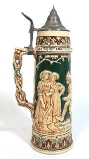 Antique German Porcelain Stein with Pewter lid. Measures approximately 15" tall.