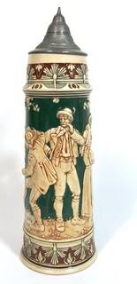 Antique German Porcelain Stein with Pewter lid. Measures approximately 15" tall.