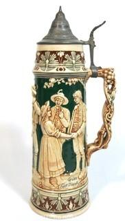 Antique German Porcelain Stein with Pewter lid. Measures approximately 15" tall.