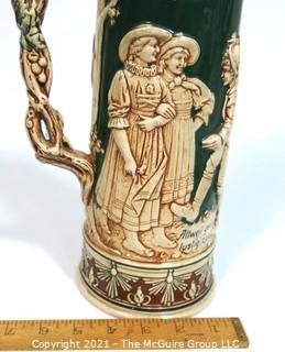 Antique German Porcelain Stein with Pewter lid. Measures approximately 15" tall.