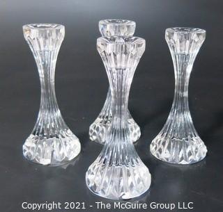 Set of (4) Baccarat Cut Crystal Candle Sticks with Deep Bevel Cuts in Massena Pattern.  They measure approximately 6 1/2" tall. 