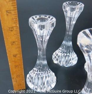 Set of (4) Baccarat Cut Crystal Candle Sticks with Deep Bevel Cuts in Massena Pattern.  They measure approximately 6 1/2" tall. 