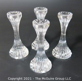 Set of (4) Baccarat Cut Crystal Candle Sticks with Deep Bevel Cuts in Massena Pattern.  They measure approximately 6 1/2" tall. 