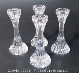 Set of (4) Baccarat Cut Crystal Candle Sticks with Deep Bevel Cuts in Massena Pattern.  They measure approximately 6 1/2" tall. 