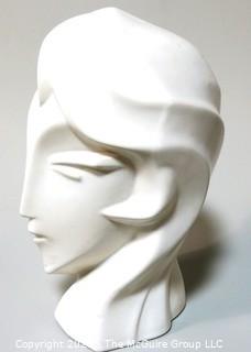 Sleek Art Deco White Ceramic Bust of Female Head. Measures approximately 12" tall.