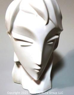 Sleek Art Deco White Ceramic Bust of Female Head. Measures approximately 12" tall.