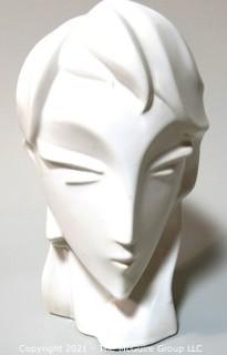 Sleek Art Deco White Ceramic Bust of Female Head. Measures approximately 12" tall.