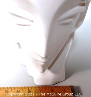 Sleek Art Deco White Ceramic Bust of Female Head. Measures approximately 12" tall.