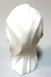 Sleek Art Deco White Ceramic Bust of Female Head. Measures approximately 12" tall.