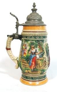 Vintage German Pottery Beer Stein with Pewter Hinged Lid.  Measures approximately 10" tall.