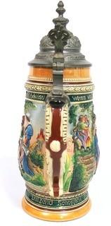 Vintage German Pottery Beer Stein with Pewter Hinged Lid.  Measures approximately 10" tall.