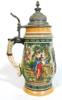 Vintage German Pottery Beer Stein with Pewter Hinged Lid.  Measures approximately 10" tall.