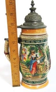 Vintage German Pottery Beer Stein with Pewter Hinged Lid.  Measures approximately 10" tall.