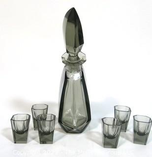 Palda Set of Grey Crystal Liquor Decanter with Six Matching Glasses.  <br> <br> Many of the Karl Palda Bohemian Art Deco cut glass pieces in this auction were featured in the book “Collectible Bohemian Glass (1915 – 1945) Volume II” by Robert & Deborah Truitt.