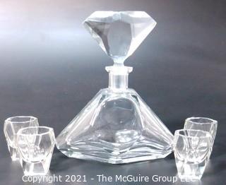 Clear Glass Liquor Decanter with Four Matching Glasses.  Chip on lip of decanter.