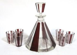 Palda Bohemian Czech Art Deco Cut Glass Liquor Decanter with Red Decoration and 6 Glasses.  Some chips in glasses. <br> <br> Many of the Karl Palda Bohemian Art Deco cut glass pieces in this auction were featured in the book “Collectible Bohemian Glass (1915 – 1945) Volume II” by Robert & Deborah Truitt.