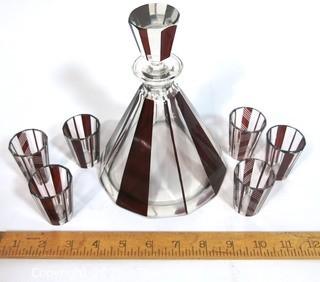 Palda Bohemian Czech Art Deco Cut Glass Liquor Decanter with Red Decoration and 6 Glasses.  Some chips in glasses. <br> <br> Many of the Karl Palda Bohemian Art Deco cut glass pieces in this auction were featured in the book “Collectible Bohemian Glass (1915 – 1945) Volume II” by Robert & Deborah Truitt.