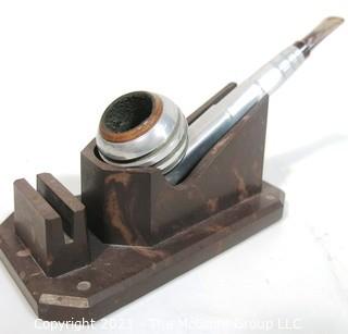 Art Deco Machine Age Aluminum Streamliner Tobacco Pipe with Bakelite Stand.  Some Damage to stand. 