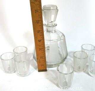 Palda Czech Art Deco Clear Cut Glass Liquor Decanter with 7 Glasses  Chip in Lip of Decanter.  <br> <br> Many of the Karl Palda Bohemian Art Deco cut glass pieces in this auction were featured in the book “Collectible Bohemian Glass (1915 – 1945) Volume II” by Robert & Deborah Truitt.