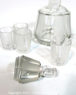 Palda Czech Art Deco Clear Cut Glass Liquor Decanter with 7 Glasses  Chip in Lip of Decanter.  <br> <br> Many of the Karl Palda Bohemian Art Deco cut glass pieces in this auction were featured in the book “Collectible Bohemian Glass (1915 – 1945) Volume II” by Robert & Deborah Truitt.