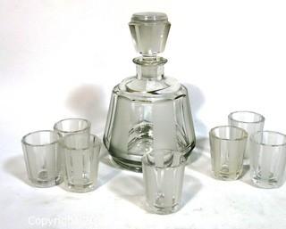 Palda Czech Art Deco Clear Cut Glass Liquor Decanter with 7 Glasses  Chip in Lip of Decanter.  <br> <br> Many of the Karl Palda Bohemian Art Deco cut glass pieces in this auction were featured in the book “Collectible Bohemian Glass (1915 – 1945) Volume II” by Robert & Deborah Truitt.