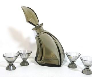 Palda Smoky Grey Czech Art Deco Cut Glass Liquor Decanter 4 Glasses, <br> <br> Many of the Karl Palda Bohemian Art Deco cut glass pieces in this auction were featured in the book “Collectible Bohemian Glass (1915 – 1945) Volume II” by Robert & Deborah Truitt.