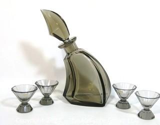 Palda Smoky Grey Czech Art Deco Cut Glass Liquor Decanter 4 Glasses, <br> <br> Many of the Karl Palda Bohemian Art Deco cut glass pieces in this auction were featured in the book “Collectible Bohemian Glass (1915 – 1945) Volume II” by Robert & Deborah Truitt.