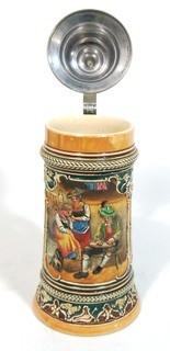 Antique German Porcelain Stein with Pewter Hinged Lid. Measures approximately 10" tall.