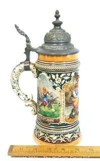 Antique German Porcelain Stein with Pewter Hinged Lid. Measures approximately 10" tall.