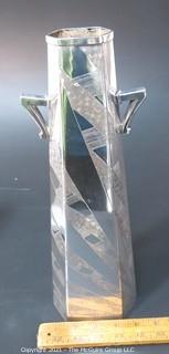 Vintage Art Deco Silver Plate Vase Made by Weidlich Bros with Geometric Design. Marked BMMTS for  Britannia Metal Mounts. Measures approximately 14" tall.  