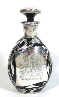 Antique Circa 1930, Haig & Haig Pinch Glass Decanter Bottle (Scotland) with Stopper and Sterling Silver Overlay.  Originally Given as a Trophy in a Golf Tournament.  Engraving Reads "One Up, Two to Go".  Measures approximately  9" tall.