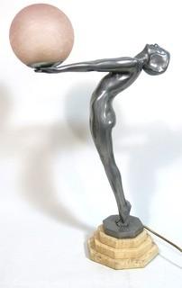 Art Deco Pewter Lamp of Woman with Outstretched Arms Holding Pink Glass Globe Shade on Marble Base.  Measures approximately 25" tall.  