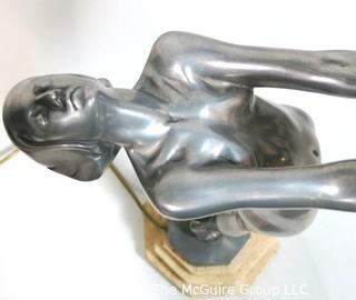 Art Deco Pewter Lamp of Woman with Outstretched Arms Holding Pink Glass Globe Shade on Marble Base.  Measures approximately 25" tall.  