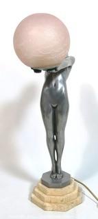 Art Deco Pewter Lamp of Woman with Outstretched Arms Holding Pink Glass Globe Shade on Marble Base.  Measures approximately 25" tall.  