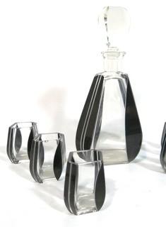 Palda Bohemian Czech Art Deco Cut Glass Liquor Decanter with Black Lotus Decoration and  5 Glasses.  <br> <br> Many of the Karl Palda Bohemian Art Deco cut glass pieces in this auction were featured in the book “Collectible Bohemian Glass (1915 – 1945) Volume II” by Robert & Deborah Truitt.