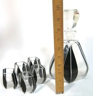 Palda Bohemian Czech Art Deco Cut Glass Liquor Decanter with Black Lotus Decoration and  5 Glasses.  <br> <br> Many of the Karl Palda Bohemian Art Deco cut glass pieces in this auction were featured in the book “Collectible Bohemian Glass (1915 – 1945) Volume II” by Robert & Deborah Truitt.