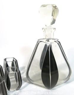 Palda Bohemian Czech Art Deco Cut Glass Liquor Decanter with Black Lotus Decoration and  5 Glasses.  <br> <br> Many of the Karl Palda Bohemian Art Deco cut glass pieces in this auction were featured in the book “Collectible Bohemian Glass (1915 – 1945) Volume II” by Robert & Deborah Truitt.