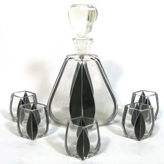 Palda Bohemian Czech Art Deco Cut Glass Liquor Decanter with Black Lotus Decoration and  5 Glasses.  <br> <br> Many of the Karl Palda Bohemian Art Deco cut glass pieces in this auction were featured in the book “Collectible Bohemian Glass (1915 – 1945) Volume II” by Robert & Deborah Truitt.