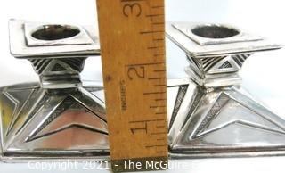 Pair of  Vintage Art Deco Silver Plate Candlesticks Made by Weidlich Bros with Geometric Design. They measures approximately 2.5" tall and 3" wide.