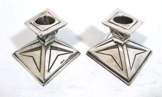 Pair of  Vintage Art Deco Silver Plate Candlesticks Made by Weidlich Bros with Geometric Design. They measures approximately 2.5" tall and 3" wide.