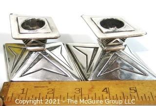 Pair of  Vintage Art Deco Silver Plate Candlesticks Made by Weidlich Bros with Geometric Design. They measures approximately 2.5" tall and 3" wide.