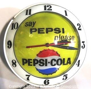 Vintage Deco Light Up Electric Pepsi Wall Clock.  Measures approximately 15" in diameter with convex glass lens and is in working condition