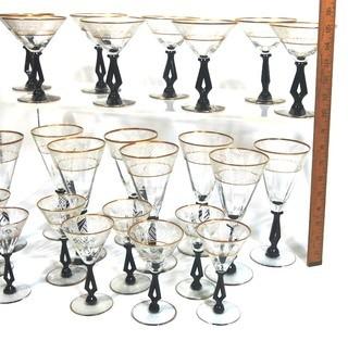 (24) Piece Set of Etched Crystal Glassware with Gilt Edge and Black Open work Base.  